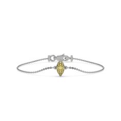 Fancy Yellow Solitaire Marquise Diamond Bracelet made with fancy yellow Marquise diamond, securely set in prong setting.Details: - Made to Order- Diamond Weight: 1.00 CT, 1.25 CT, 1.50 CT, 1.75 CT, 2.00 CT, 2.50 CT, 3.00 CT- No of Diamonds: 1- Diamond Cut: Marquise- Diamond Type: Lab Grown Diamond (CVD, HPHT)- Diamond Clarity: VS - Diamond Color: Fancy Yellow- Setting Type: prong- Bracelet Thickness: 5.85 MM- Bracelet Width: 11.80 MM - Metal Type: 14K Solid Gold,18K Solid Gold- Choice of Gold Color: Yellow Gold, White Gold, Rose Gold- Jewelry Certificate: All our jewelry comes with a 3rd Party Lab Certificate, verifying the authenticity of diamond and gold. Modern Yellow Diamond Jewelry, Elegant Yellow Marquise Jewelry, Yellow Marquise Fine Jewelry, Marquise Diamond Bracelet, Marquise Solitaire, Solitaire Bracelet, Fancy Yellow Diamond, Halo Earrings, Halo Earrings Studs