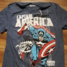 Old Navy Captain America Tshirt "Classics" New Size: Xl Blue Graphic Design Short Sleeve T-shirt, Blue Crew Neck Shirt With Graphic Design, Cotton Graphic Design Tops For Fan Merchandise, Cotton Graphic Print Tops For Fans, Blue Graphic Print Crew Neck T-shirt, Blue Crew Neck Shirt With Front Print, Pop Culture Cotton Top With Graphic Print, Blue Crew Neck T-shirt For Fan Merchandise, Blue Short Sleeve T-shirt With Graphic Print