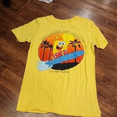 Small 100% Cotton Spongebob Square Pants "Goo Lagoon Surf Contest Ocean Pacific" Graphic Tee Shirt. Yellow. Never Worn. Goo Lagoon, Spongebob Square Pants, Spongebob Square, Square Pants, Graphic Tee Shirt, Spongebob Squarepants, Graphic Tee Shirts, Blue Yellow, Tee Shirt