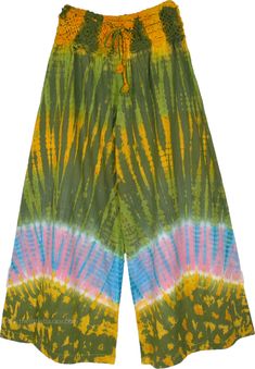 It is a unique way of bridging the past and the present, reviving old trends and giving them a contemporary twist.  A fun tie-dye wide-leg palazzo pants with a twist- a beautiful crochet yoke. #tlb #SplitSkirtsPants #TieDye #bohemianfashion #Handmade #printedcottonpants #tiedyepants #crochetwaistpants Hippie Style Relaxed Fit Wide Leg Pants For Spring, Bohemian Multicolor Wide Leg Pants For Spring, Hippie Style Multicolor Wide Leg Pants, Hippie Multicolor Wide Leg Pants, Casual Multicolor Cotton Wide Leg Pants, Casual Multicolor Wide Leg Summer Pants, Bohemian Tie Dye Cotton Bottoms, Multicolor Cotton Wide Leg Hippie Pants, Hippie Multicolor Wide Leg Pants For Festivals