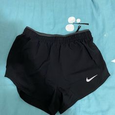 Nike Black Running Shorts Brand New With Tags Size Xsmall Retails $40 Nike Black Athletic Shorts With Built-in Shorts, Nike Black Bottoms With Built-in Shorts, Nike Black Athletic Shorts For Workout, Nike Black Gym Shorts, Nike Black Stretch Bottoms, Black Stretch Nike Bottoms, Casual Black Nike Shorts, Nike Black Workout Shorts, Black Running Shorts