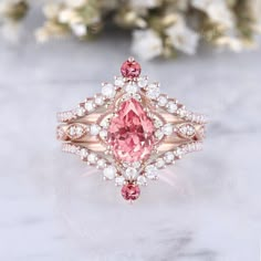 Vintage Pink Engagement Rings, Vintage Engagement Rings Pink Sapphire, Pink Wedding Rings With Gemstone Accents, Wedding Rings With Pink Sapphire And Accent Stones, Pear Engagement Rings, Pink Sapphire Wedding Ring, Engagement Rings Moissanite, Wedding Rings Pink Sapphire