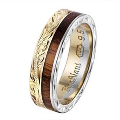 In this photo there is a white and yellow gold two-tone koa wood ring with scroll hand engravings. Hawaiian Wedding Rings, Hawaiian Heirloom Jewelry, Hawaiian Bracelets, Koa Wood Ring, Wood Wedding Ring, Heirloom Jewelry, Wood Wedding Band, Hawaiian Jewelry, Koa Wood