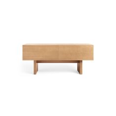 the sideboard is made out of wood and has an open drawer on one end