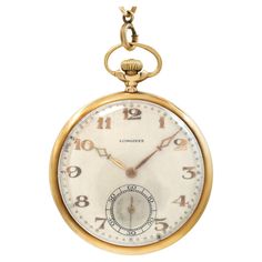 Longines pocket watch in 14k yellow gold with a gold plated chain. Manual wind 17 jewel movent. Arabic numerals. 43 mm case size. Fine Pre-owned Longines Watch. Certified preowned Vintage Longines pocket watch watch is made out of yellow gold. This Longines watch has a 43 x 43 mm case with a Round caseback and Silver Arabic Numeral dial. It is Certified Authentic and comes backed by our 12-month warranty. Each watch is inspected by our certified in-house Swiss-trained watchmakers before shipment including final servicing, cleaning, and polishing. If you have inquiries about this Longines pocket watch please reference W526989. Longines Watch, Vintage Pocket Watch, Gold Plated Chains, Big Boys, Vintage Watches, Pocket Watch, Silver Gold, Vintage Jewelry, Gold Plate