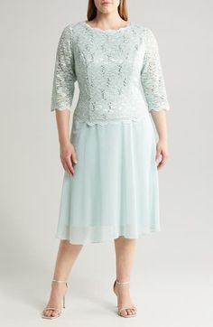 Scalloped stretch lace alight in sequins layers the bodice of this formal dress with a flowing chiffon skirt that gives the illusion of coordinated separates. 47" length (size 18W) Hidden back-zip closure Bateau neck Elbow-length sleeves Bra friendly Lined, except sleeves 58% nylon, 40% polyester, 2% spandex with 100% polyester contrast Hand wash, dry flat Imported Women's Clothing Spring Lace Mother Of The Bride Dress With Sequins, Spring Gala Lace Mother Of The Bride Dress, Spring Gala Mother Of The Bride Lace Dress, Spring Formal Lace Mother Of The Bride Dress, Elegant Fitted Chiffon Lace Dress, Elegant Chiffon Lace Dress For Party, Sequin Lace Evening Dress For Mother Of The Bride, Fitted Formal Dress With Overlay, Formal Fitted Dress With Overlay