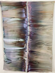 an abstract painting on canvas with water and sky in the background, hanging on a wall