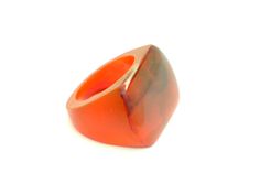 This ring is made with a red resin bedded in a special mold and after polished to be smoothy like a sea glass. The ring has an organic, rounded shape. It looks great with jeans or makes a statement when you're ready to go out. It's a cocktail ring or a contemporary piece. The size is medium size, 7.5 USA (United States). I can enlarge a bit. If you need help for your ring size, check out http://en.wikipedia.org/wiki/Ring_size Ready to ship! My work features brilliant colors and clear resin.The r Blood Ring, Colorful Ring, Ring Resin, Red Ring, Amber Resin, Contemporary Ring, Soft Toothbrush, Resin Ring, Gold Flakes