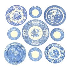 blue and white plates are arranged in the shape of a flowered design on a white background