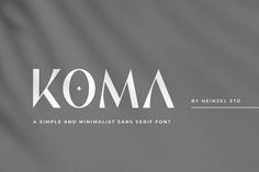 the koma font and minimalist sans - serift typeface is displayed on a gray background