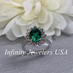 Emerald Halo Ring 14k White Gold, Vintage Emerald Engagement Ring, Oval Halo Ring With Emerald, May Birthstone Ring, Emerald Jewelry #6719 We feature the finest quality lab grown emeralds in the world. The properties of lab-grown are physically, chemically and visually identical to natural, just grown in a lab setting. Emerald is the birthstone of May -Approximate total carat weight: 2.50ctw diamond equivalent -Center Stone Size: 9x7mm approx. 2.10ct. diamond equivalent -Center Stone Shape: oval Oval Emerald Ring In 14k White Gold, Emerald Cluster Ring With Halo For Anniversary, Gia Certified Oval Emerald Cluster Ring, Gia Certified Oval Cluster Ring, Oval Halo Ring With May Birthstone, Formal Oval Green Cluster Ring, Formal Green Oval Cluster Ring, Emerald Cluster Ring With Halo Setting For Anniversary, Anniversary Emerald Halo Ring With Center Stone