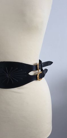 "Vintage 1970s black leather belt . ✂-----Measurements : length: 32 1/2\" width: 3 1/2\" brand: n/a condition: excellent Shipping Is Avaliable Worldwide. Every item is carefully shipped Priority via Air Mail - shipping takes from 7 to 14 working days, depending on your location. Shipping includes Tracking. Come and check out our shop to see all items! https://www.etsy.com/shop/Themagicstories?ref=hdr_shop_menu Thanks!" Vintage Black Belt With Antique Buckle, Vintage Black Adjustable Belt Buckles, Vintage Adjustable Black Belt Buckles, Vintage Black Belt Buckle With Antique Design, Vintage Black Adjustable Belt, Vintage Black Belt With Removable Buckle, Adjustable Vintage Corset Belt, Adjustable Vintage Corset Belt With Removable Feature, Belt Vintage