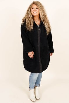 Stay warm and look stylish with this adorable coat in classic black! Its soft construction offers both comfort and coziness, while its pockets and button-up style provide function as well as style! The perfect length and color make this coat the ideal addition to any wardrobe! Self- 100% PolyesterLining- 100% Nylon Cozy Long Sleeve Outerwear With Buttoned Pockets, Cozy Black Button-up Outerwear, Black Button-up Winter Outerwear, Cozy Outerwear With Buttons For Cold Weather, Cozy Sweater Coat With Button Closure For Work, Black Oversized Buttoned Outerwear, Cozy Workwear Sweater Coat With Button Closure, Oversized Button-up Sweater Coat With Pockets, Black Oversized Outerwear With Buttons