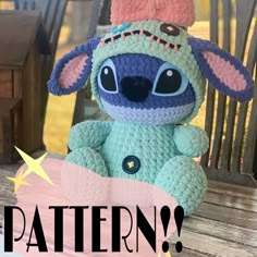 a crocheted stuffed animal sitting on top of a wooden bench with the words pattern written below it