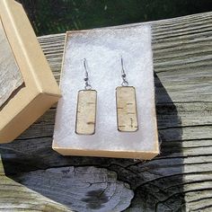 "Handmade Silver Finish Birch Bark Earrings from a fallen Birch tree. Mounted in a setting with a bubble of clear artists resin on top.  Gold variations available.   Feel free to ask about colors or styles. Will ship in a decorated box and comes with plastic backs.  Handmade in Boston in my studio. Size is 3/8\" by 1\" long. Thanks for looking. Ships in 1 day.  Gold options avaialble also,  just let me know when you order if you prefer silver or gold. ✨ Feel Free to CONNECT!! ** Visit my website Rectangular Clear Earrings For Gift, Handmade Clear Rectangular Jewelry, Birch Earrings, Birch Bark Earrings, 18k Gold Earrings, Silver Birch, Custom Gift Boxes, Birch Bark, Native American Beading