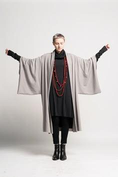 "This great Gray Unisex Japanese Haori kimono Jacket is a very chic addition to your wardrobe and upgrades any outfit. The Haori Kimono can be combined with most of your outfits, be it Pants, Jumpsuits, and skirts. This Haori is suitable for men and Women. Color: Light Gray. Material: Viscose MEASUREMENTS OF THE HAORI:ONE SIZE BODY PART: Bust - 126cm / 49\" inches Hips - 126 cm / 49\" inches Waist - 126 cm / 49\" inches Length (shoulder to bottom) 105 cm / 41\" inches SLEEVE: Length: 52cm / 20\" Oversized Outfit Women Street Style, Hooded Kimono Pattern, Haori Street Style, Japanese Boho Fashion, Japanese Business Fashion, Modern Haori Outfit, Oversized Outerwear With Kimono Sleeves For Fall, Oversized Fall Outerwear With Kimono Sleeves, Oversized Kimono With Kimono Sleeves For Winter