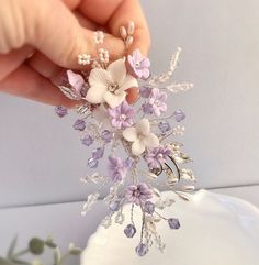 Bridal hair piece ~ Hand made item All my bridal hair accessories are made to the very highest standard using the finest quality materials whilst paying care and attention to detail.   Materials . White seed beads . Lilac sparkling crystals with Swarovski elements  . Hand made clay flowers in white and lilac  . Rhinestones  . Silver leaves . Silver plated wire . Silver coloured comb . Width = 7.2 cm x Length = 17.3 cm. Your hairpiece will arrive in a luxury presentation box for safe keeping for Purple Flowers In Hair, Bride Hair Clips, Hair Piece Wedding Hair, Bridal Flower Headband, Brides Hair, Bridesmaid Hair Pieces, Bride Hair Piece, Hair Piece Wedding, Bridal Hair Piece