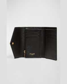 "Find SAINT LAURENT Ysl Monogram Trifold Wallet In Grained Leather on Editorialist. Saint Laurent wallet in chevronquilted powdergrain calf leather with signature YSL monogram at center with overstitching Envelope flap with snap closure Golden hardware Interior, one bill and six card slots Four slip pockets; zip coin slot 3.9\"H x 4.9\"W x 1\"D Made in Italy" Ysl Wallet Aesthetic, Ysl Wallet, Pocket Notes, Coin Slot, Large Wallet, How To Finish A Quilt, Saint Laurent Wallet, Dark Khaki, Zip Wallet