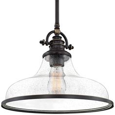 an antique style light fixture with clear glass and black metal trim, hanging from the ceiling