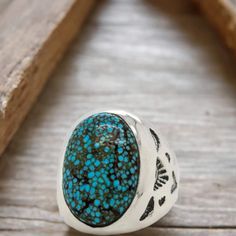 Embrace the artistry of the Southwest with this captivating Handmade Kingman Turquoise Ring (Size 9). Crafted by a skilled Arizona artisan, this unique piece features a genuine Kingman turquoise gemstone, renowned for its captivating blue hues and intricate matrix patterns.Genuine Kingman Turquoise: The centerpiece of this ring is a stunning Kingman turquoise stone, boasting the captivating beauty of the American Southwest.A Touch of Luxury: This handcrafted ring adds a touch of sophistication a Artisan Turquoise Cabochon Ring, Handmade Turquoise Open Ring, Artisan Turquoise Ring With Natural Stones, American Southwest, Kingman Turquoise, Handcrafted Rings, Southwestern Style, Turquoise Gemstone, Blue Hues