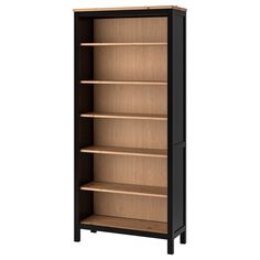 a bookcase with three shelves and two doors on each side, in black and oak