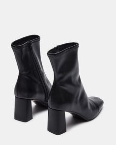 For the perfect seasonal transition style, look no further. HUSH is a sleek ankle boot with a sock-like fit and brings a chic touch to these versatile booties. 2.75 inch heel height 9.5 inch shaft circumference 6.25 inch shaft height Vegan leather or synthetic upper material Textile and vegan leather lining Vegan leather sock Synthetic sole Imported Black Ankle Boots Aesthetic, Enderman Costume, Black Boots Woman, Short Black Heels, Steve Madden Boots Ankle, Short Heel Boots, Women's Booties, Steve Madden Store, Short Leather Boots