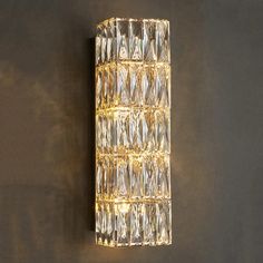 Elevate your home decor with the luxurious elegance of the Bacci Crystal Wall Sconce. Featuring stunning crystals, this wall sconce adds a touch of glamour and sophistication to any room. Illuminate your space with its soft, ambient light and create a warm and inviting atmosphere. Installation Method: Assembly Light Source: LED bulbs (Included) Base Type: E14 Voltage: 90-260V Style: Modern Installation Type: Wall Mounted Item Type: Wall Sconces Warranty: 1 year Dimmable: No Material: Stainless Steel, Crystal Shade Direction: Up & Down Power Source: AC Use: Daily Lighting Background Tv, Wall Lamp Living Room, Entryway Chandelier, Wall Lamps Living Room, Bedroom Led, Wall Lamp Design, Crystal Wall Sconces, Pendant Lighting Dining Room, Dining Room Light Fixtures