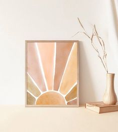 a painting on a shelf next to a vase