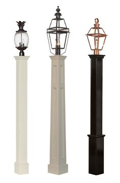 three different types of lamps on pedestals with one light turned on and the other turned off