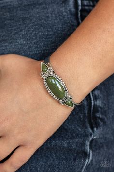 Infused with studded and filigree detail, two teardrop green beads flank an oversized oval green bead atop a dainty silver cuff for a colorful tribal inspired fashion. Green Beaded Bracelets, Green Bracelet, Green Beads, Bracelet Online, Paparazzi Accessories, Paparazzi Jewelry, Inspired Fashion, Silver Cuff Bracelet, Green Bead