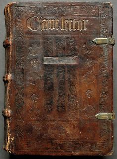 an old leather book with writing on the front and back cover that reads, canterman