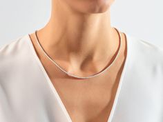 Introducing the Moissanite Tennis Necklace, crafted with elegant 2.00 mm moissanite stones for an unbelievably glamorous look. An exclusive piece of jewelry, each diamond-like stone sparkles and shines with unparalleled brilliance, perfect for a special occasion or everyday luxury. Features Made to Order Gold Kt: 14K Solid Gold or 18K Solid Gold Gold Colors: Rose Gold, Yellow Gold, White Gold Gemstone: Moissanite Stone Cut: Round Stone Size: 2.00 mm Wide: 2.40 mm Color - Clarity: Colorless (E, F Diamond Tennis Necklace, Everyday Luxury, Gold Colors, Tennis Necklace, Statement Pendant, Short Necklace, Necklace Sizes, Layered Look, Diamond Stone