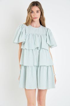 This Gingham Print Tiered Dress is an ideal addition to your wardrobe. Featuring a round neckline short sleeves and a loose fit the mini length dress also has beautiful tiered details. Perfect for any occasion the dress will keep you feeling comfortable and stylish all day. Round neckline Short sleeves Tiered Loose fit Back neck button closure Lined Hand wash cold Do not bleach Do not tumble dry Iron low Shell: 100% Polyester Lining: 100% Polyester BH735D Total length:34.5 " Bust:37 " S GREEN/WHITE: Height 5'9" / Bust 30" / Waist 24.5" / Hip 34" Pregnant Fashion, Fit Back, Teacher Outfits, Gingham Print, Tiered Dress, Maternity Fashion, Green Dress, Round Neckline, Gingham