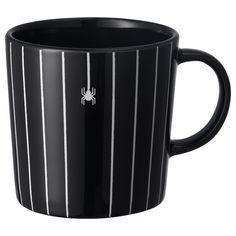 a black coffee mug with white stripes on the outside and a spiderman logo on the inside