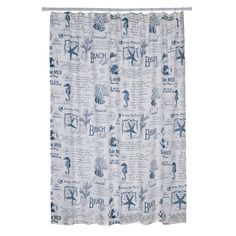 a shower curtain with blue and white sea themed designs on the front, along with an ocean theme