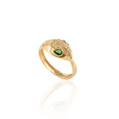 This is part of Chairish’s Fine Jewelry assortment.  Statement Diamond and Natural Emerald Snake Head Ring in 18K Gold featuring natural emerald of 0.19 carats and diamonds of 0.14 carats. The gorgeous handcrafted ring goes with every style. Emerald enhances intellectual capacity of the person. Designed with a serpentine head studded with diamond on top with emerald studded in the eye and the body of the snake connects with the head making a ring. This unique snake head ring is a perfect fit to wear it on your occasion or style it with any of your basic outfit to give it a glam. This is a perfect Unique Gift, Bridal Shower Gift, Secret Santa Gift, Gift For Sister, Mother Daughter Gift, Bride To Be Gift, Bridesmaid Gift, Thanksgiving Gift, Christmas Gift or any Holiday Gift for Mother, Sist Luxury Green Rings With Diamond Accents, Luxury Green Rings With Single Cut Diamonds, Luxury Green Emerald Ring With Single Cut Diamonds, Luxury Emerald Rings With Rose Cut Diamonds, Luxury Yellow Gold Emerald Ring With Single Cut Diamonds, Luxury Diamond Ring For May Birthstone, Luxury Green Diamond Open Ring, Luxury Rings With Diamond Accents For May Birthstone, Luxury Tsavorite Ring For May Birthstone