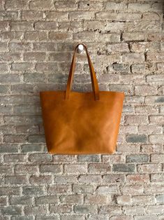 Oversized Camel Leather tote bag. Cap Sa Sal Bag. Handmade. | Etsy Camel Tote Bag With Leather Handles, Classic Dark Tan Bags For Daily Use, Travel Tote Bag With Vegetable-tanned Leather, Dark Tan Bags With Leather Lining For Everyday Use, Dark Tan Bag With Leather Lining For Everyday Use, Rectangular Caramel Shoulder Bag For Daily Use, Caramel Tote Shoulder Bag, Caramel Travel Tote Bag, Vegetable Tanned Leather Tote Bag For Daily Use