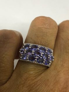 Unusual Deep purple blue Tanzanite Sterling Filigree Setting Handmade size 6 Can be resized, my jeweler uses a laser and charges a $10 -$20 fee. All rings are shipped in a nice gift box. Check out our over a THOUSAND great reviews Engraving is $4 per letter and is not always perfect depending on the piece. It can take a few days if the jeweler is busy. This is payable to Paypal Judithsltd@gmail.com Fine Jewelry In Blue Amethyst, Fine Jewelry Blue Amethyst Jewelry, Formal Blue Amethyst Ring, Purple Tanzanite Sapphire Ring As A Gift, Blue Multi-stone Amethyst Ring As Gift, Blue Oval Amethyst Ring In Sterling Silver, Blue Amethyst Jewelry With Accent Stones, Blue Amethyst Ring With Accent Stones In Sterling Silver, Blue Oval Amethyst Jewelry