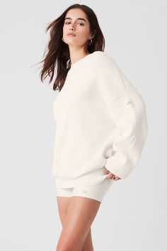 Sweater weather, solved. Warm up with the Scholar Crew Neck Sweater made from a street-forward heavyweight knit in an oversized silhouette that earns top marks wherever it goes. Ribbed detailing on the cuffs, hem and neckline complete the look. Pair it with shorts or your go-to pair of trousers. Sport Fits, Womens Onesie, Yoga Sweatshirt, Top Marks, Womens Capris, Sweatshirt Outfit, School Shopping, Oversized Silhouette, Sweater Making