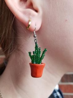 Show off your green thumb, or lack there of, with these adorable little beaded plants in tiny clay pots! Casual Beaded Earrings For Gift, Beaded Plants, Crazy Earrings, Accessory Inspo, Diy Earrings Polymer Clay, Clay Things, Indie Jewelry, Funky Earrings, Earring Ideas