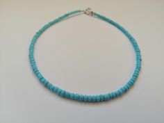 Minimalist Beaded Necklace This is a dainty beaded necklace, made with pretty glass seed beads. It is on a beading wire and it has and extender for additional length. Let me know if you have any questions :) Happy shopping!! Blue Minimalist Necklaces With Spacer Beads, Minimalist Blue Necklaces With Spacer Beads, Blue Minimalist Necklace With Spacer Beads, Blue Single Strand Minimalist Beaded Necklaces, Minimalist Single Strand Blue Beaded Necklace, Minimalist Blue Round Beads Choker, Blue Beaded Choker With Tiny Beads, Minimalist Blue Beaded Turquoise Necklace, Adjustable Blue Choker With Tiny Beads