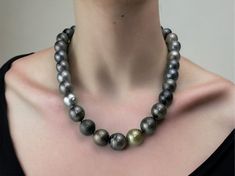 Gorgeous genuine large Tahitian pearl knotted necklace, perfect gift for her, for mom  This necklace is a substantial, investment piece!  Wear as is, for a classic minimal look, like Angelina seen on first image, or layer with your fave necklaces! This handmade Tahitian knotted Pearl Necklace will surely wow you! A head turner piece of jewelry! The baroque pearls are huge size, genuine, Tahitian cultured pearls, semi round shape, AA quality, measures 12mm to 16mm, multi color gray, silvery, some Pearl Necklace With Large Beads As Gift, Pearl Necklace With Large Beads For Gift, Large Beads Pearl Necklace As Gift, Gift Tahitian Pearl Necklace With High Luster, High Luster Tahitian Pearl Necklace As Gift, Grey Pearl Necklace, Pink Pouch, Knotted Necklace, Pearls Necklace