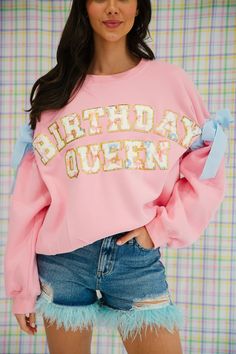 Celebrate in style with our BIRTHDAY QUEEN RIBBON PINK PULLOVER! This oversized pullover features playful blue ribbon bows on the sleeves and floral glam "Birthday Queen" letters. Perfect for the ultimate queen of the day! This is a made-to-order item. All customized orders are currently shipping within 14 business days. To receive item quicker, expedited shipping is available at checkout. Pink Long Sleeve Birthday Sweatshirt, Pink Long Sleeve Sweatshirt For Birthdays, Pink Long Sleeve Sweatshirt For Birthday, Boutique Store Front Ideas, Kids Baseball Room, Glam Birthday, Formal Chic, Squad Outfits, Our Birthday