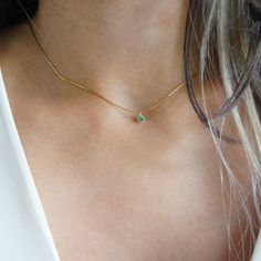 Dainty Minimalist Tiny Emerald Gold Necklace Everyday Simple Tiny Necklace May Birthstone Necklace Gift Green Crystal Choker Gift for Her This lovely and minimalist necklace features a tiny and adorable Cubic Zirconia green stone. Perfect to layer with other necklaces from our shop. Extremely teeny tiny charm. Charm measures 3mm approx. Delicate snake chain to complete the look. Sturdy chain. Finished with a lobster clasp. Cheap Green Minimalist Jewelry, Cheap Everyday Green Jewelry, Cheap Dainty Green Jewelry, Cheap Green Dainty Jewelry, Cheap Green Minimalist Necklaces, Luxury Green Minimalist Necklace, Cheap Green Everyday Jewelry, Luxury Green Dainty Necklace, Affordable Green Tiny Beads Choker