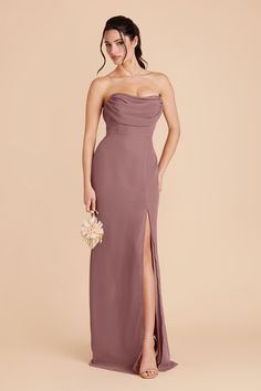 a bridesmaid in a strapless dress with high slit