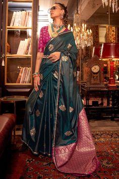 The Banarasi Satin Saree is a luxurious blend of tradition and elegance, woven with intricate zari patterns that shimmer with every movement. Its smooth satin texture offers a regal drape, making it perfect for festive occasions and grand celebrations. This saree is a timeless piece that embodies the rich heritage of Banaras, bringing a touch of opulence to your wardrobe. --------------------------------- S A R E E ● D E T A I L S --------------------------------- ● Fall and Edging : Done ● Tass Teal Green Saree Contrast Blouse, Drapping Saree, Pink Satin Blouse, Handloom Weaving, Satin Saree, Green Saree, Elegant Saree, Casual Wedding, Satin Silk