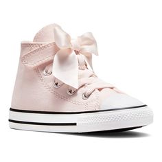 She'll step into style in these Converse Chuck Taylor All Star Ruffles & Bows toddler girl shoes. Click this FOOTWEAR GUIDE to find the perfect fit and more! She'll step into style in these Converse Chuck Taylor All Star Ruffles & Bows toddler girl shoes. Click this FOOTWEAR GUIDE to find the perfect fit and more! TECHNOLOGIES & FEATURES Features ruffle trim and an oversized stain bow Soft underfoot cushioning helps support comfortable play Adjustable strap for easy on and offDETAILS Canvas upper Mesh lining Rubber outsole Foam midsole Foam footbed Plain toe Slip on Elastic & hook-and-loop tape closure Multi-directional outsole Spot clean Imported Size: 10 T. Color: Blush Hush. Gender: female. Pink Adjustable Lace-up Sneakers, Pink High Tops, Shoe Size Chart Kids, Toddler Girl Shoes, Hook And Loop Tape, Color Blush, Baby Sneakers, Girl Shoes, Converse Chuck Taylor All Star