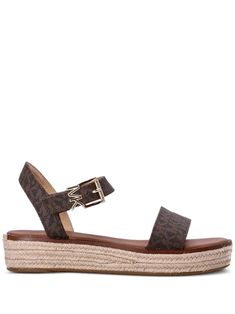 brown calf leather monogram jacquard gold-tone logo plaque logo-engraved gold-tone hardware branded heel counter single toe strap round open toe buckle-fastening ankle strap branded footbed braided raffia sole