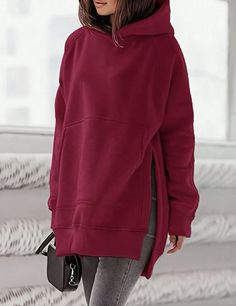 This hoodie from Split is perfect for any woman who wants to look stylish and feel comfortable while working out or during any casual activity. The hoodie has a red color with a split hem design and raglan sleeves. It is made of 100% polyester material and has a regular fit, which is suitable for size M. The hoodie is a pullover type with no zippers or buttons and is perfect for activewear occasions. It has a hood and is designed with a focus on comfort and style. The hoodie is brand new with ta New Uses, Red Hoodie, Look Stylish, Split Hem, Working Out, Raglan Sleeve, Polyester Material, Red Color, To Look