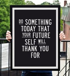 a person holding up a sign that says do something today that your future self will thank you for